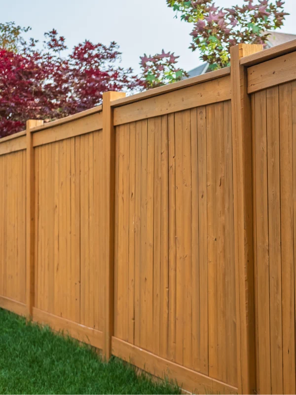 Wooden fence with modern design installed by HD Exteriors